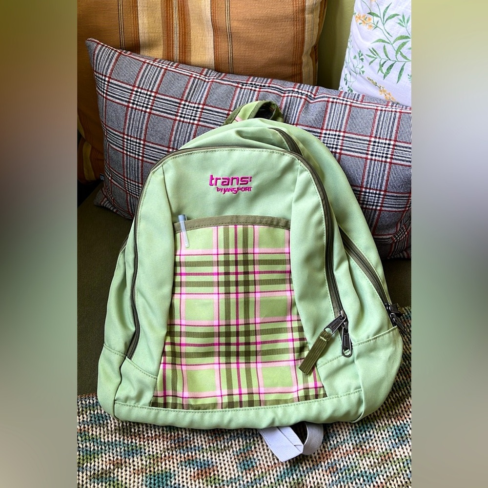 Jansport trans backpack with multiple compartments and pockets